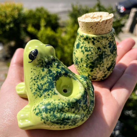 Handmade ceramic frog pipe and jar set with natural green design, ideal for eco-friendly stoners.